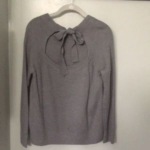 Gray sweater with cut out back detail